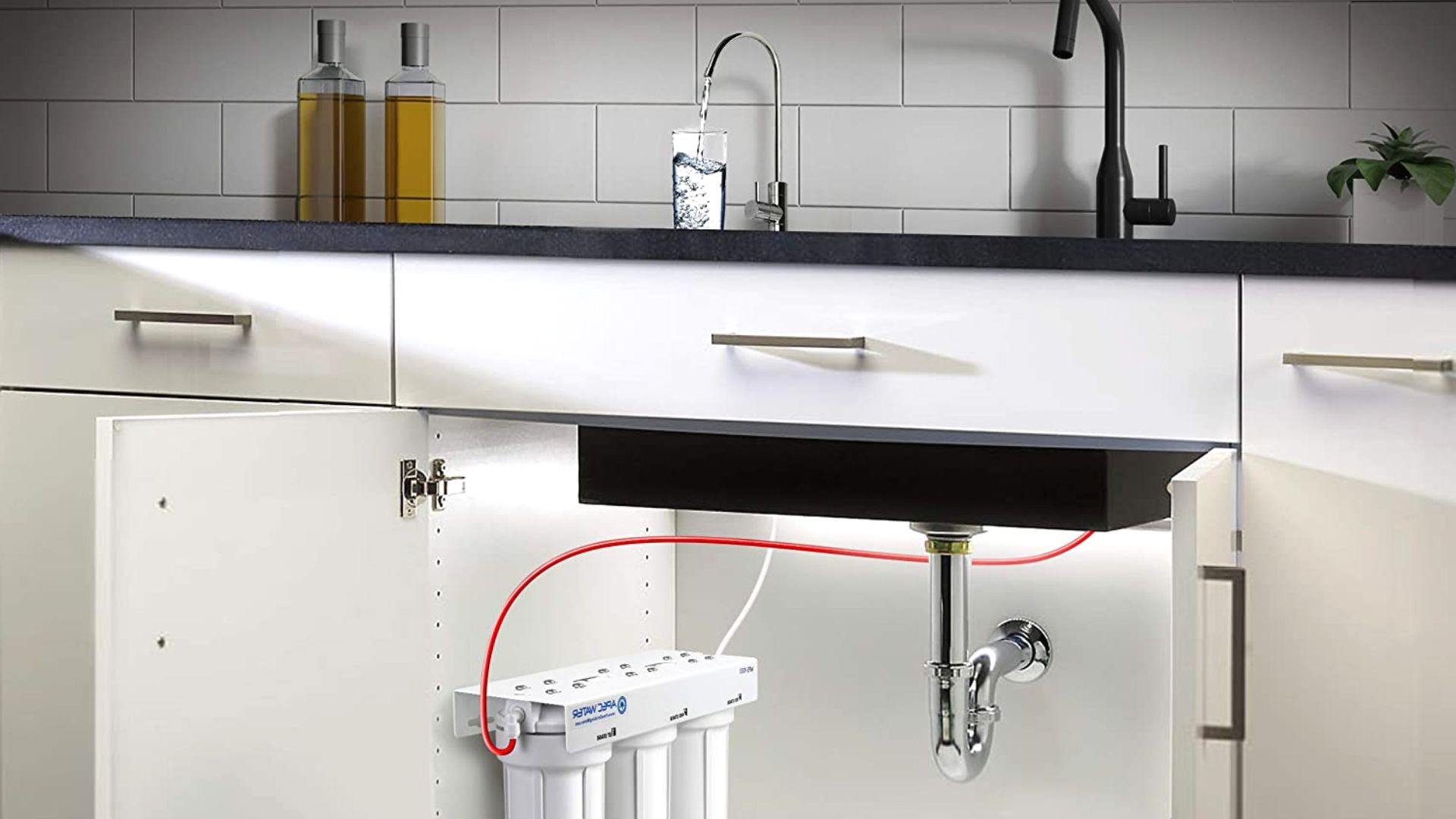 https://goldcoastplumbingcompany.com.au/wp-content/uploads/2022/09/water-filtration-system-installed-under-sink.jpg
