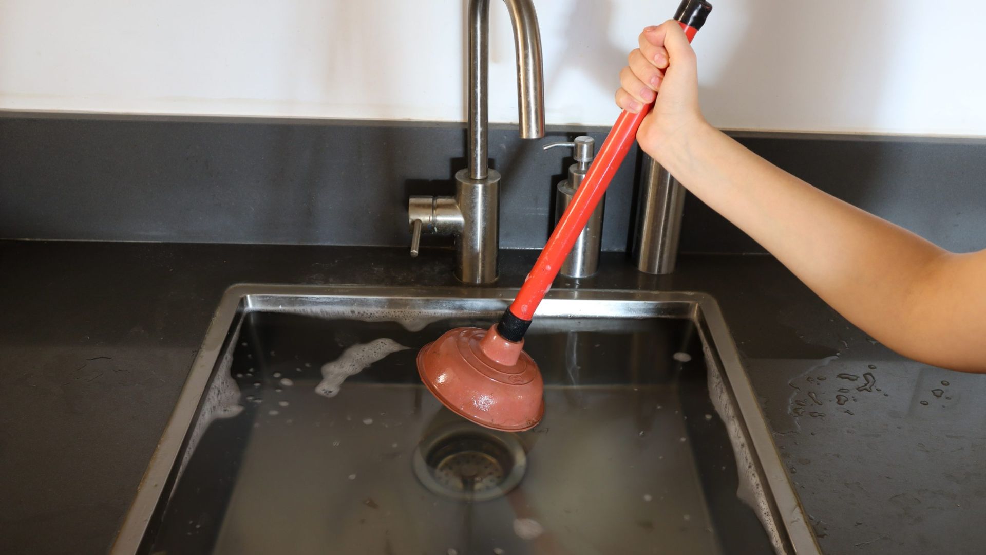 Using Plunger To Unblock Sink