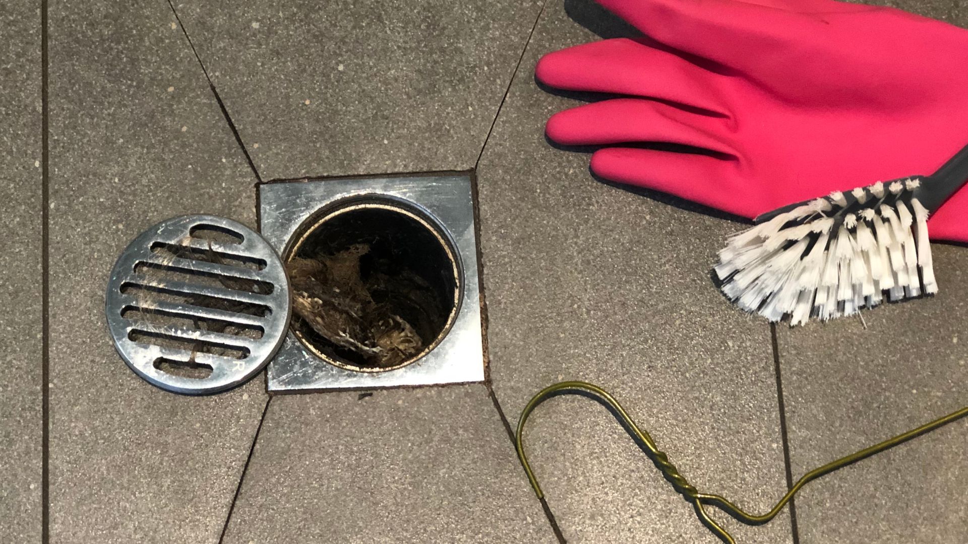 Fixing Overflowing Floor Drain With Tools